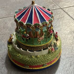 Colorful Carousel Figurine with Red and Blue Details